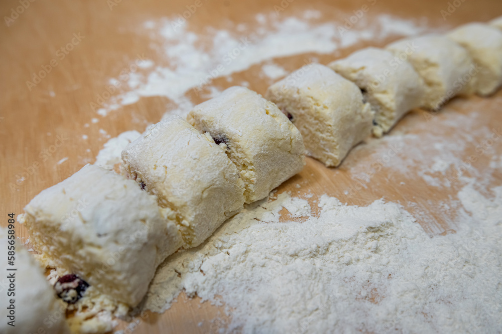 lots of raw dough with raisins lots of raw dough with raisins