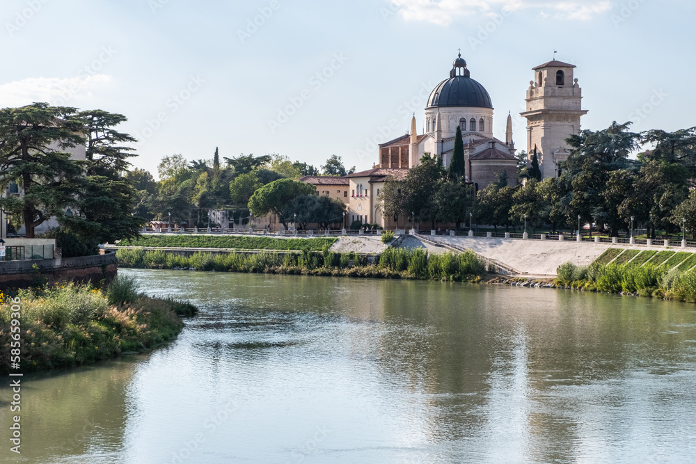 The calm waters of the Adige river cross the ancient city of Verona The calm waters of the Adige river cross the ancient city of Verona