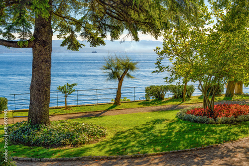 Fototapeta Naklejka Na Ścianę i Meble -  Beautiful public park in old town of Lovran at Kvarner gulf in Adriatic sea.