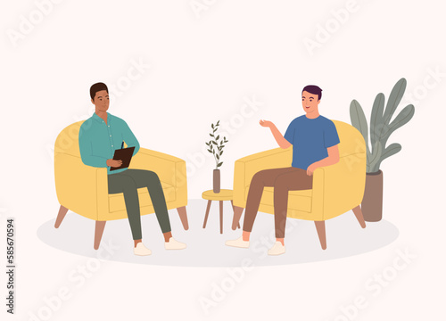 Smiling Black Male Psychologist Listening To His Client While Taking Notes During The Consultation Session. Psychology. Psychotherapy. Psychiatric. Counselee. Psychiatrist.