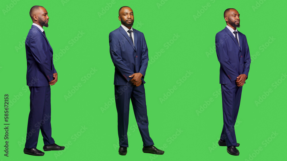 Young office worker with formal suit smiling on camera, posing with confidence over full body greenscreen. Male entrepreneur and businessman feeling sylish and modern, professional person. Young office worker with formal suit smiling on camera, posing with confidence over full body greenscreen. Male entrepreneur and businessman feeling sylish and modern, professional person.