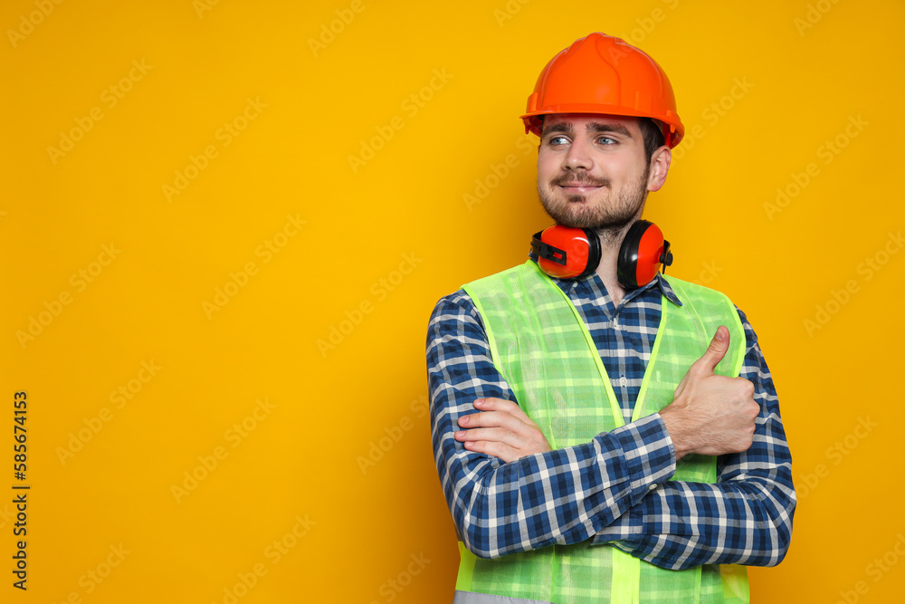 Young man civil engineer in safety hat Young man civil engineer in safety hat