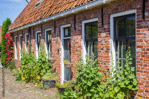 Flowers and plants on the facade of a house in Bourtange, Netherlands