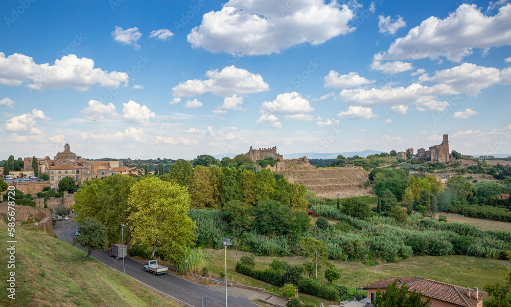 Italy, Lazio, Tuscania, Summer clouds floating over edge of town Italy, Lazio, Tuscania, Summer clouds floating over edge of town