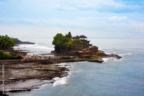 Tanah lot hindu temple on rocky coast on Bali island, Indonesia