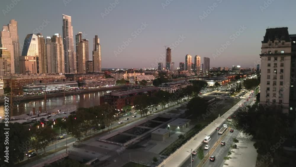 Aerial Drone Fly Above Puerto Madero Skyscrapers and Women's Bridge at Sunset Time, Buenos Aires, Argentina Aerial Drone Fly Above Puerto Madero Skyscrapers and Women's Bridge at Sunset Time, Buenos Aires, Argentina
