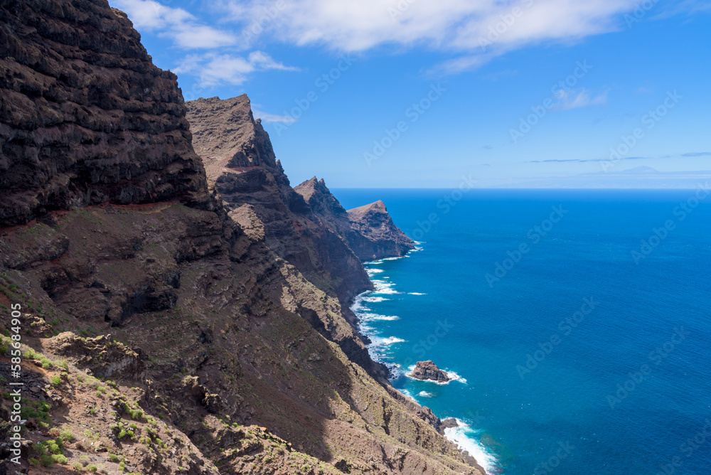 View of volcanic cliffs and Atlantic ocean from the lookout terrace Mirador del Balcon on the island of Gran Canaria, Spain.
