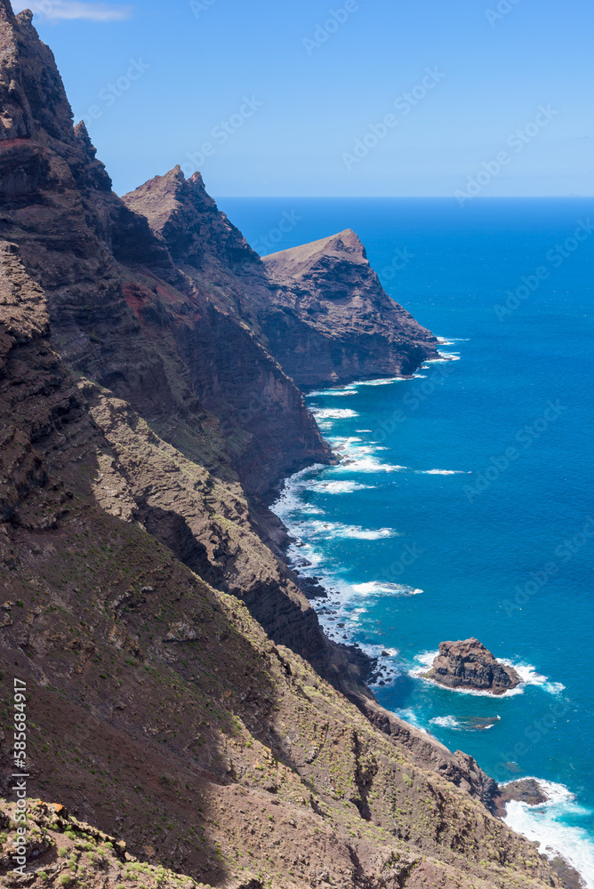 View of volcanic cliffs and Atlantic ocean from the lookout terrace Mirador del Balcon on the island of Gran Canaria, Spain.
