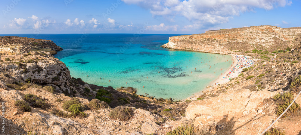 Isola dei Conigli (Rabbit Island) and its beautiful beach with turquoise sea water. Lampedusa, Sicily, Italy.