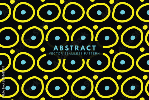 Organic yellow circles with tiny blue circles on a black background repeating pattern seamless