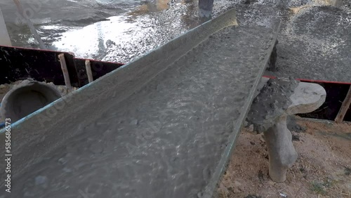 High angle of mixing cement from cement truck at the construction site, Construction concept.