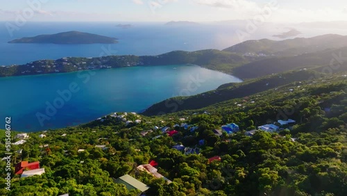 Aerial establishing shot at sunrise revealing Magens Bay in St Thomas, U.S. Virgin Islands photo