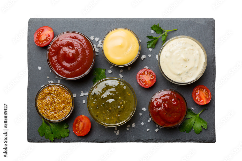Many different sauces and herbs isolated on white background, flat lay top view. sauces on plate, healthy concept Many different sauces and herbs isolated on white background, flat lay top view. sauces on plate, healthy concept