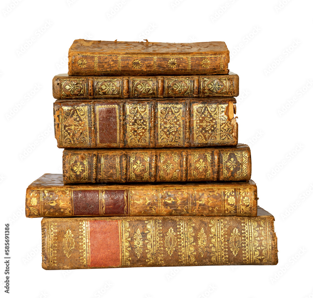 Pile of antique books with a leather cover and golden ornaments on white Pile of antique books with a leather cover and golden ornaments on white