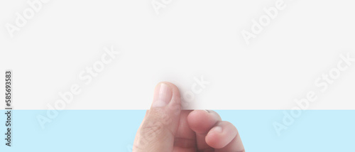 Hands holding paper blank for  letter paper