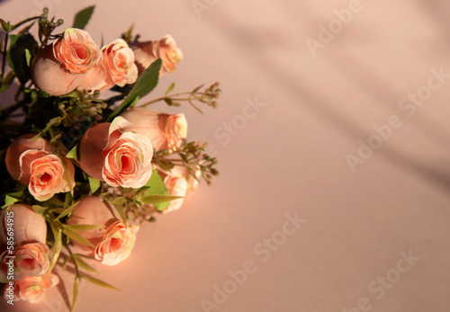 Fototapeta Naklejka Na Ścianę i Meble -  bouquet of roses on pink background, space for text, invintation 