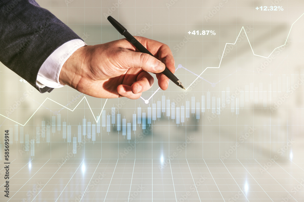 Man hand with pen working with abstract virtual financial graph on blurred office background, financial and trading concept. Multiexposure Man hand with pen working with abstract virtual financial graph on blurred office background, financial and trading concept. Multiexposure
