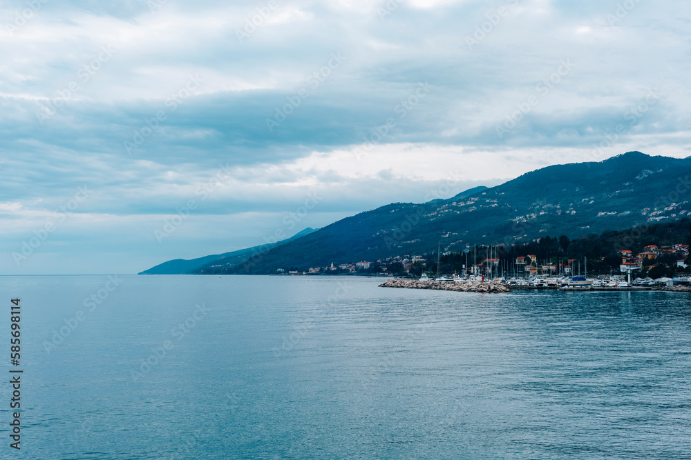 Seafront of Opatija town, Croatia. Beautiful view of the mountains on the background