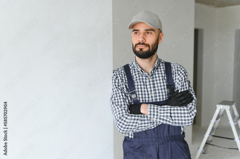 Positive male repairman at home Positive male repairman at home