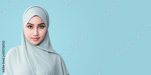 Banner of a Hijab Woman with Copy Space on a Tosca Background with Generative AI photo