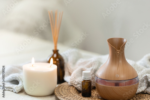 Konstfotografi Spa composition with aroma oil diffuser lamp on a blurred background