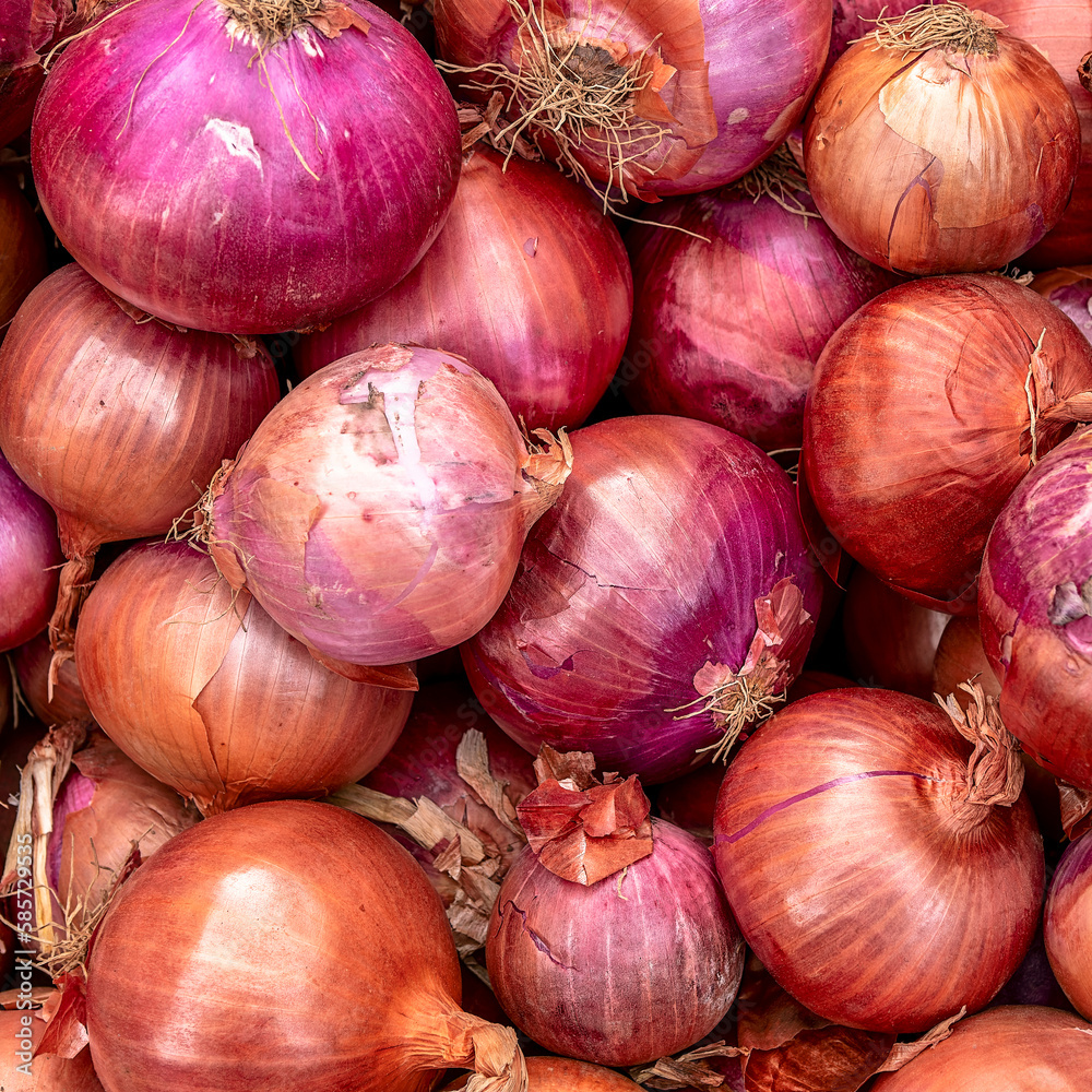 Dry, organic onions top view close up. Vegan, spicy food ingredient background. Dry, organic onions top view close up. Vegan, spicy food ingredient background.