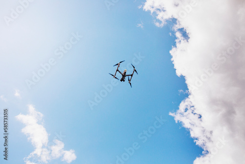 Low angle view of drone flying photo