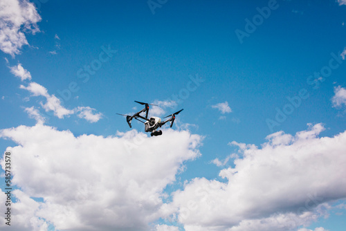 Low angle view of drone flying