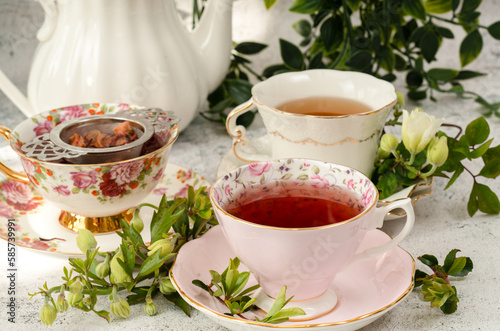 Pretty porcelain teacup with hibiscus tea
