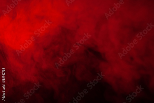 Eerie black background with billowing red smoke