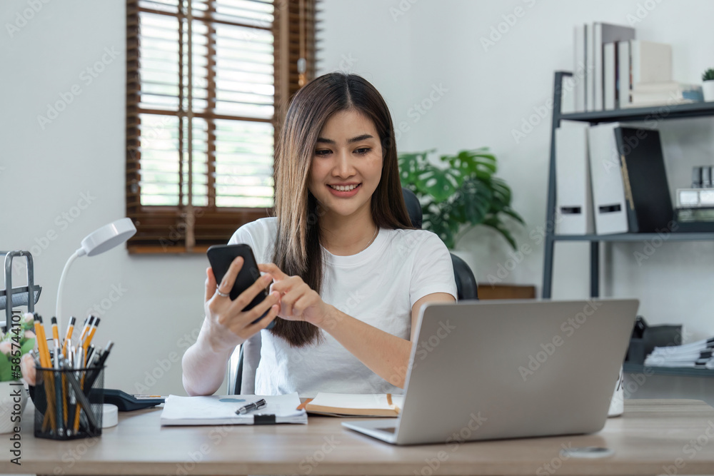 business woman with phone for communication, connection and typing while smile, happy and relax. Entrepreneur, excited and with laptop for planning at home