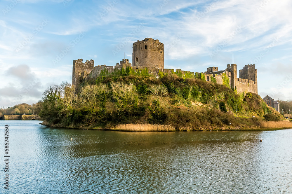 A view of the northern corner of the Norman castle at Pembroke, Wales on a bright day