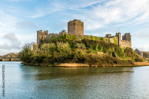 A view of the northern corner of the Norman castle at Pembroke  Wales on a bright day
