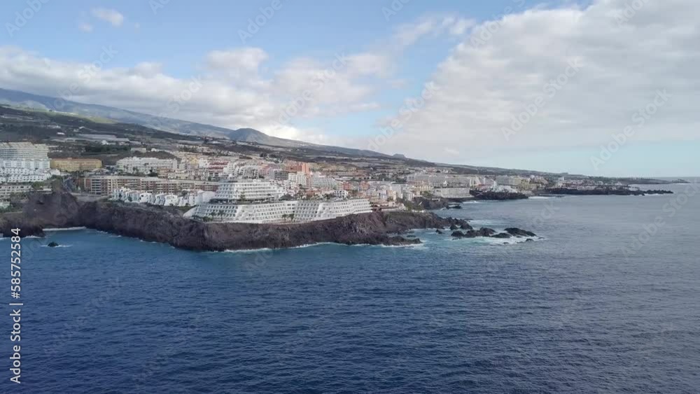 aerial view of tenerife coastline travel tourist destination drone footage of ocean seascape during a sunny day aerial view of tenerife coastline travel tourist destination drone footage of ocean seascape during a sunny day