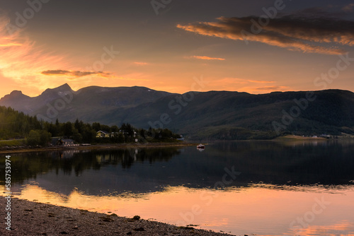 Beautiful sunset over a lake in Senja Island,  Norway photo