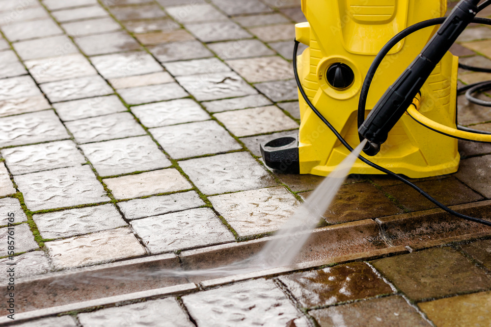 Cleaning dirty block Pavement Paving Stones and Concrete Gutter with