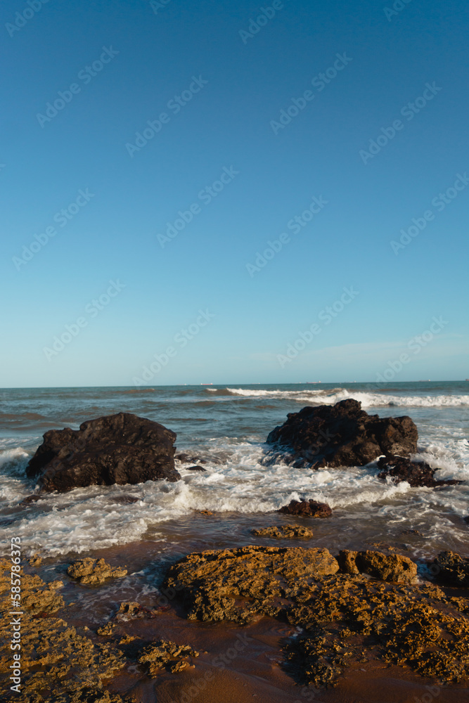 beach and rocks beach and rocks