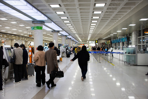 Auto machine check in plane tickets of Jeju International Airport for Korean people and foreign traveler passengers journey travel visit and checkin on February 18, 2023 in Jeju do island, South Korea photo