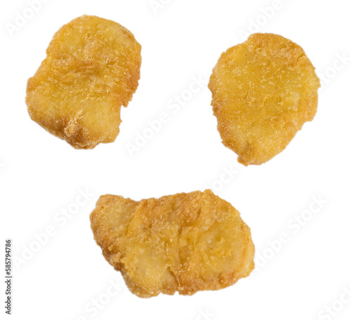 Obraz na płótnie Chicken nuggets on transparent background prepared as png file w salonie