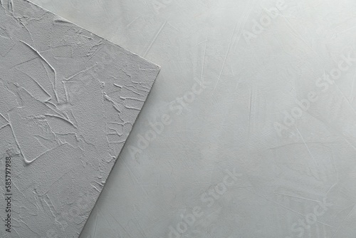Light gray textured surfaces as background, top view