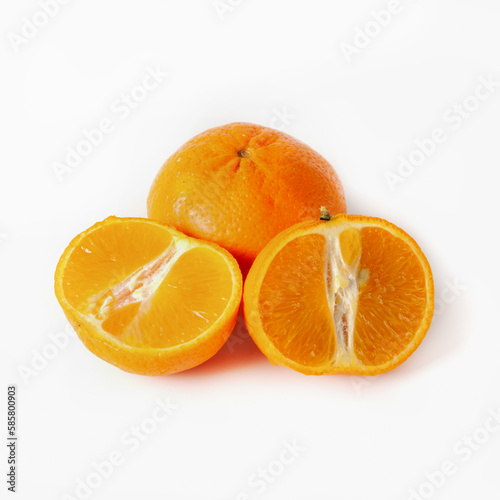 Fresh tangerine or orange with slices on a white background. Isolated