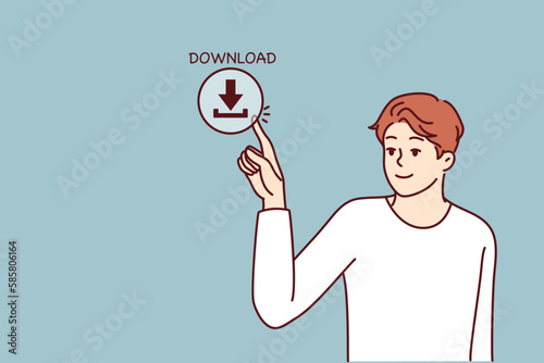 Young man presses download button on screen for concept of web content consumption and network use. Guy downloads information from Internet using cloud storage or torrent clients with media files