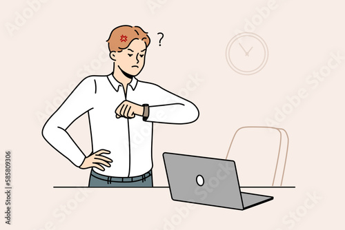 Furious businessman look at wristwatch unhappy with employee being late for work. Mad employee stand near empty desk frustrated with worker late in office. Vector illustration. 