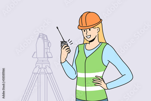 Smiling woman engineer in helmet and uniform working with geodetic equipment on construction site. Happy female surveyor engineer on building area. Vector illustration. 