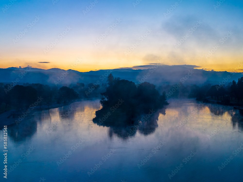 Enchanting Dusk Scene as Fog Blankets Hart Park Lake in Bakersfield