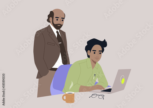 A senior manager supervising an intern in the office
