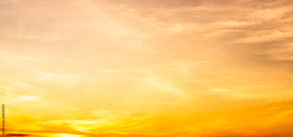 golden sunset sky with clouds