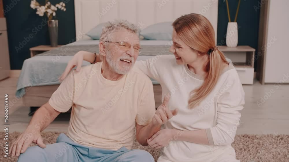 Dad and daughter are laughing and having a good time. Yoga. Happy family. sincere emotions. Morning gymnastics. Health care. Dad and daughter are laughing and having a good time. Yoga. Happy family. sincere emotions. Morning gymnastics. Health care.