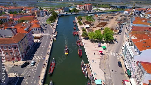 aerial view of typical Portugal houses near the canal with moliceiro boats at the old town embankment in Aveiro city center photo