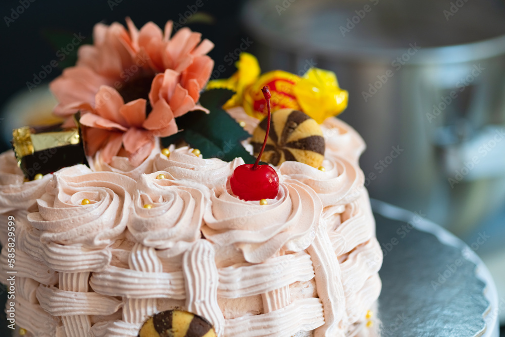 Basket-shaped cake with sweets, cookies and flowers,Easter marks the end of Holy Week Basket-shaped cake with sweets, cookies and flowers,Easter marks the end of Holy Week